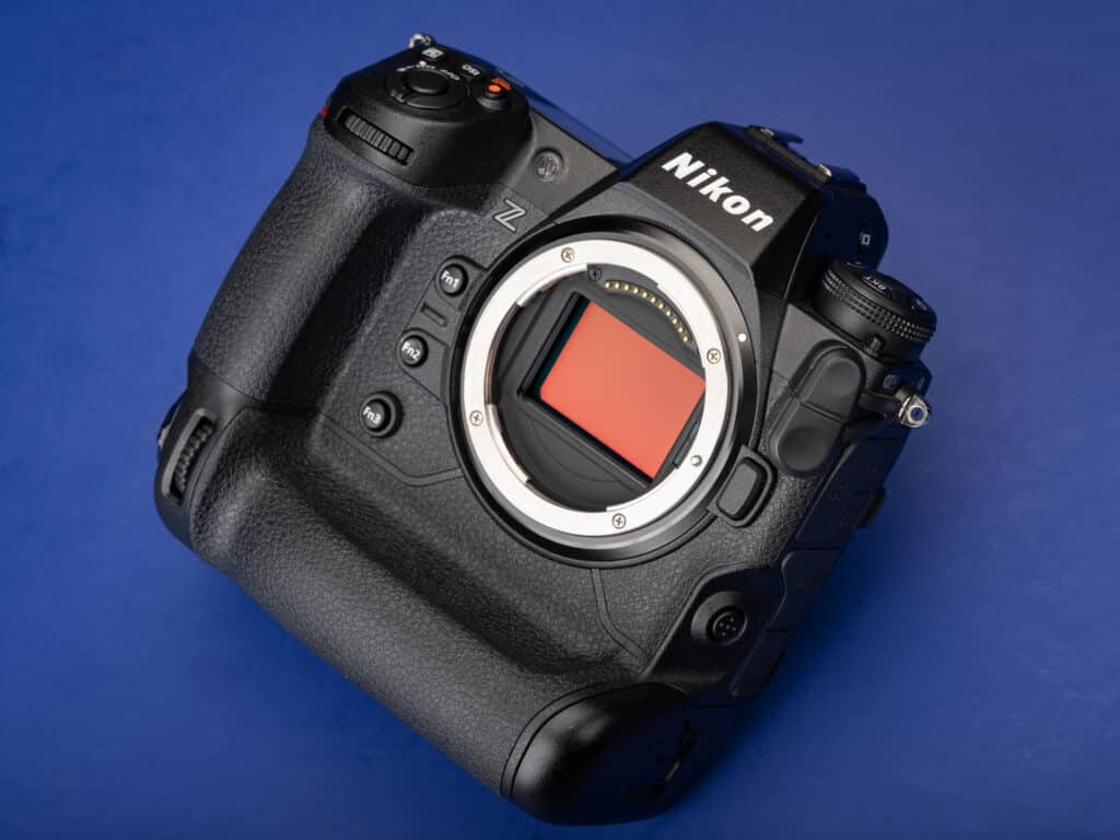 Nikon Z camera in front of blue background