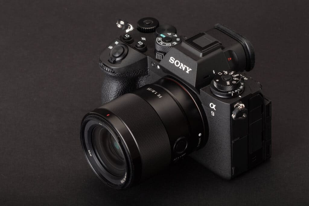 close up of sony A III camera placed on a black surface