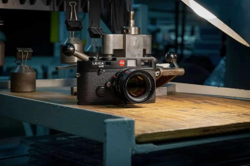 leica camera placed on a desk