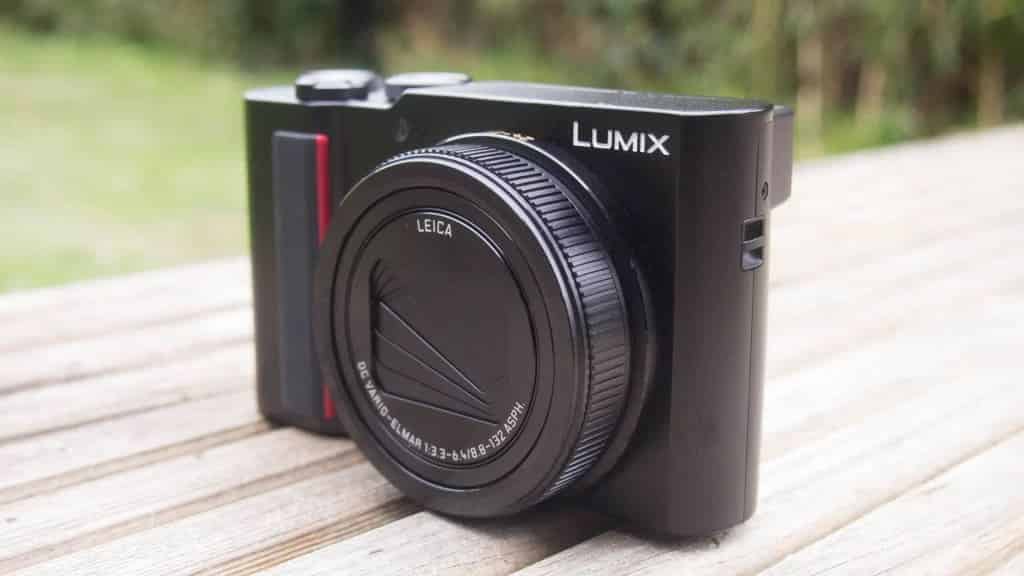 panasonic lumix placed on a wooden surface